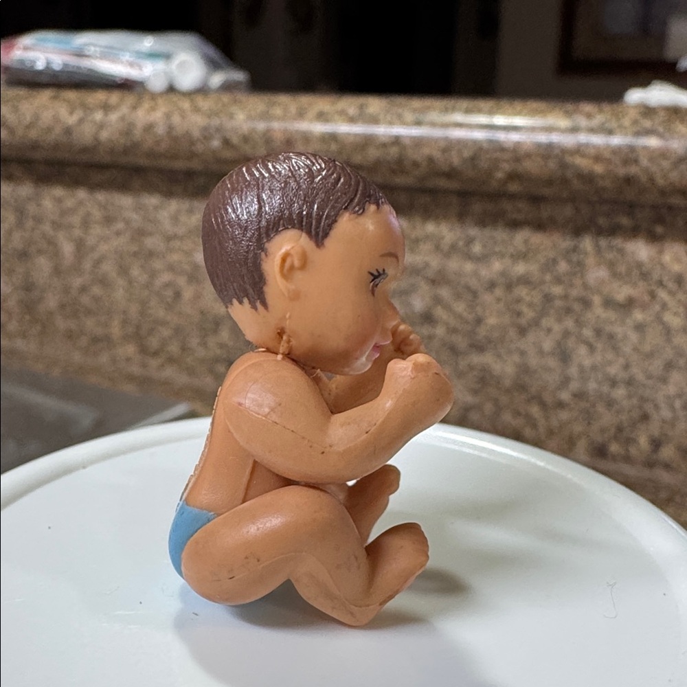 The product is a baby doll from the "Happy Family" line was a part of the Barbie - Picture 4 of 5